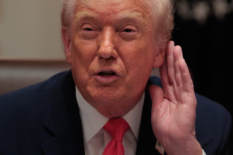President Donald Trump attends a meeting of his Cabinet in the Cabinet Room of the White House on December 02, 2025 in Washington, DC.