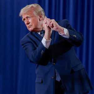 U.S. President Donald Trump reacts after delivering remarks at Rockland Community College in Suffern, New York, U.S., May 22, 2026. REUTERS/Kylie Cooper      TPX IMAGES OF THE DAY
