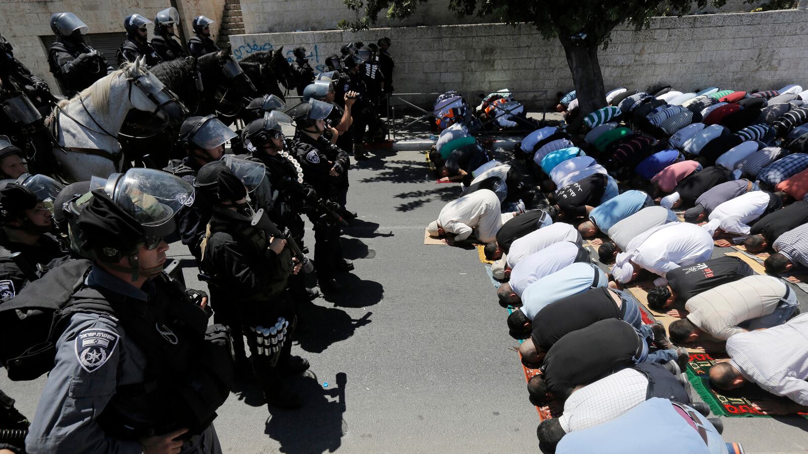 articles/2014/08/24/the-gaza-war-has-left-jerusalem-more-divided-than-ever/140823-Schwartzstein-gaza-tease_sqdvx6