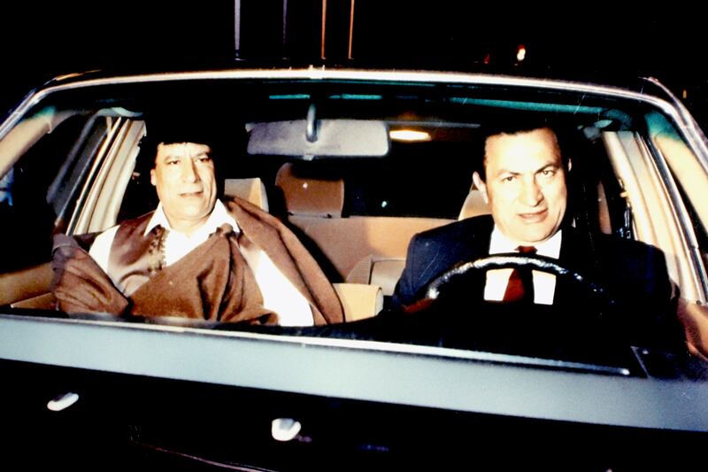 galleries/2011/10/20/muammar-gaddafi-reportedly-captured-and-killed-photos/gaddafi-obituary-mubarak-1990_b4chl4