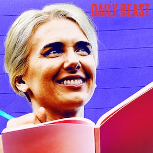 Natalie Harp with a notebook and pen.