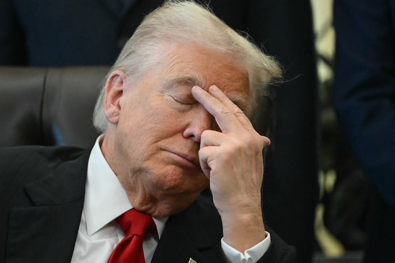 TOPSHOT - US President Donald Trump gestures as Secretary of Health and Human Services Robert F. Kennedy Jr. speaks during an event about weight-loss drugs in the Oval Office of the White House in Washington, DC on November 6, 2025. Trump announced deals Thursday with pharmaceutical giants Eli Lilly and Novo Nordisk to lower the prices of some popular weight-loss drugs. Both companies "have agreed to offer their most popular GLP-1 weight-loss drug," Trump said, "at drastic discounts." (Photo by ANDREW CABALLERO-REYNOLDS / AFP) (Photo by ANDREW CABALLERO-REYNOLDS/AFP via Getty Images)