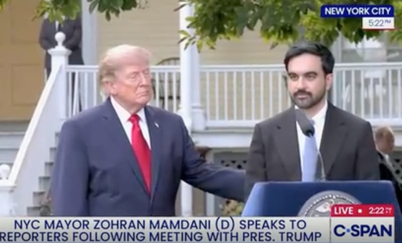 Donald Trump pats New York Mayor Zohran Mamdani on the back.