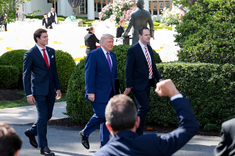 U.S. President Donald Trump walks as he arrives to host the 2026 College Football Playoff (CFP) National Champions from Indiana University at the White House in Washington, D.C., U.S., May 11, 2026. REUTERS/Kylie Cooper
