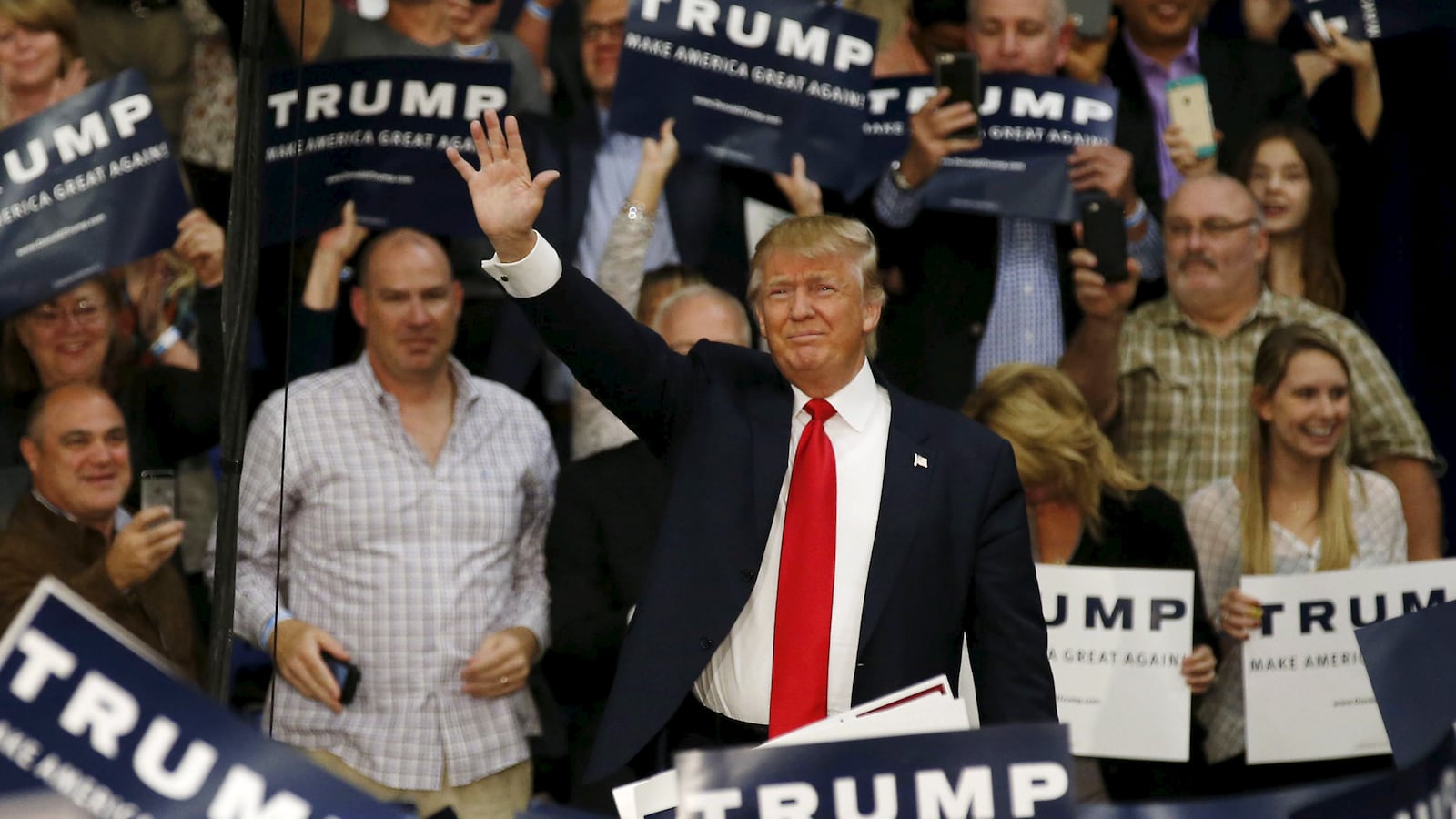 articles/2015/11/28/donald-trump-s-long-publicity-con/151127-dantonio-trump-tease_ynxolc