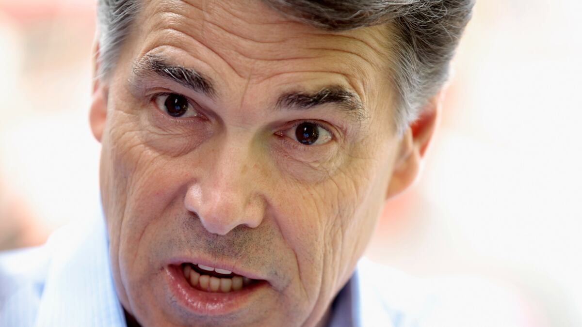 articles/2011/08/18/rick-perry-outflanking-george-w-bush-on-the-far-right/rick-perry-frightening-candidate-tomasky_f5rgoy