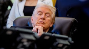 President Donald Trump with his eyes closed in the Oval Office at the White House on November 06, 2025 in Washington, DC.
