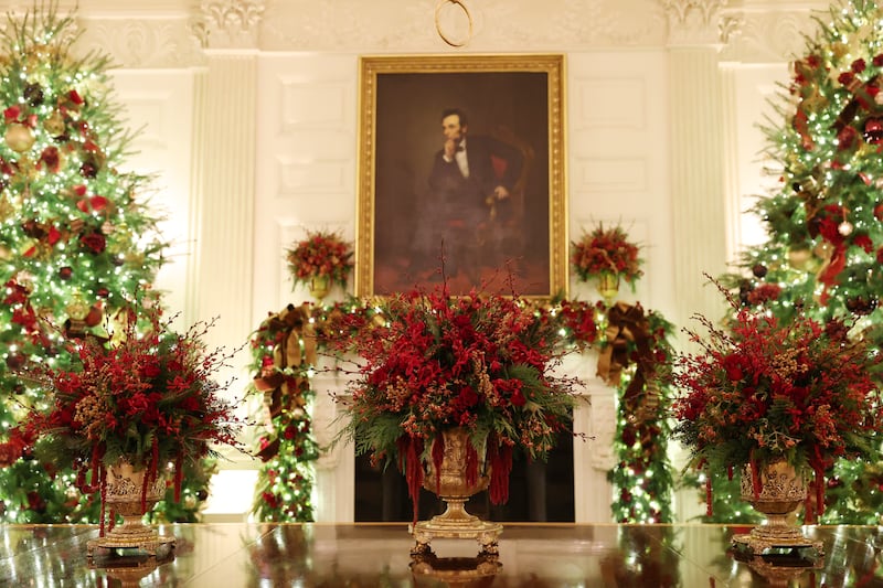 Christmas decorations are seen in the State Dining Room