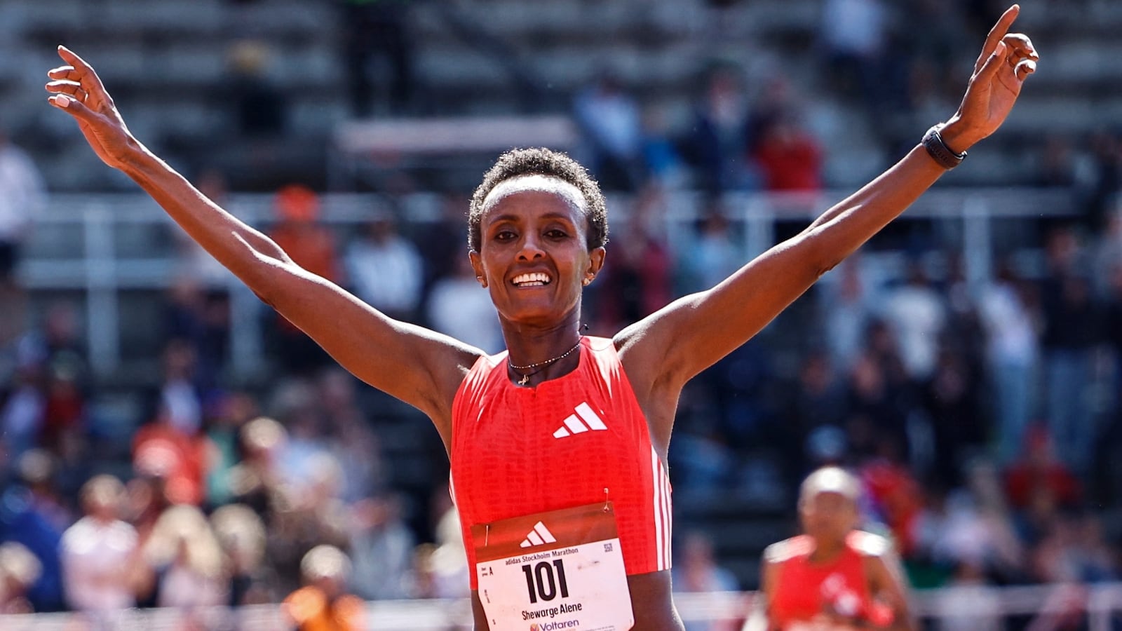 Ethiopia's Shewarge Alene crosses the finish line to win the women's race of the Stockholm marathon on May 31, 2025. (Photo by Fredrik PERSSON / various sources / AFP) / Sweden OUT (Photo by FREDRIK PERSSON/TT News Agency/TT NYHETSBYRÅN/AFP via Getty Images)