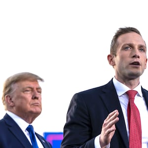 DELAWARE, OH - APRIL 23: (L-R) Former U.S. President Donald Trump listens as Max Miller, Republican candidate for Ohio's 7th congressional district, speaks during a rally hosted by the former president at the Delaware County Fairgrounds on April 23, 2022 in Delaware, Ohio. Last week, Trump announced his endorsement of J.D. Vance in the Ohio Republican Senate primary.