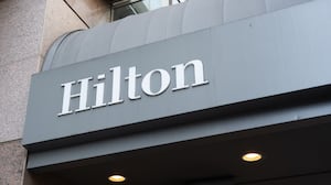 Hilton hotel entrance awning with logo and recessed lights, San Francisco, California, August 19, 2025.