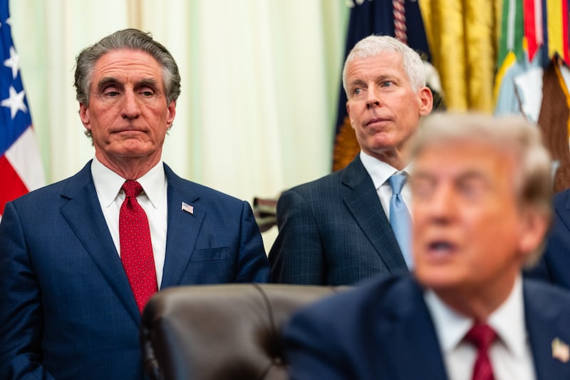 WASHINGTON, DC - JULY 24: U.S. Secretary of the Interior Doug Burgum (L) and U.S. Secretary of Energy Chris Wright (C) listen as U.S. President Donald Trump (R) speaks during an announcement on American nuclear innovation in the Oval Office at the White House on July 24, 2026 in Washington, DC. Trump is signing multiple executive orders targeting the nuclear energy sector and easing rules for new reactors and nuclear fuel supply chains. (Photo by Eric Lee/Getty Images)