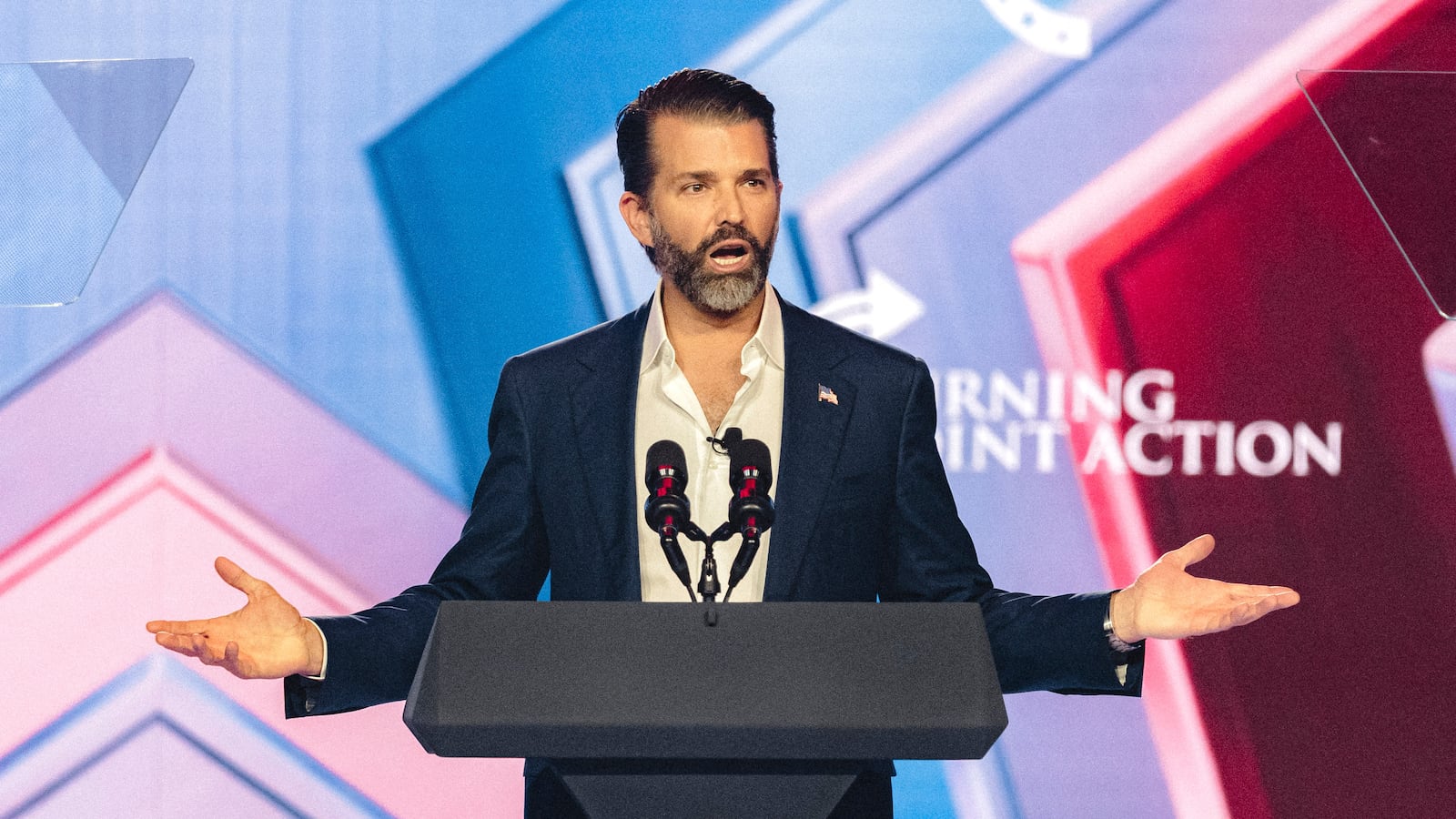 Donald Trump Jr. speaks on stage during Turning Point's annual AmericaFest conference in Phoenix, Arizona on December 21, 2025.