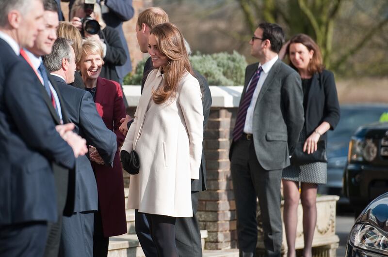 galleries/2010/12/10/kate-middleton-lookbook/130319-kate-bump-tease_kxeqcc