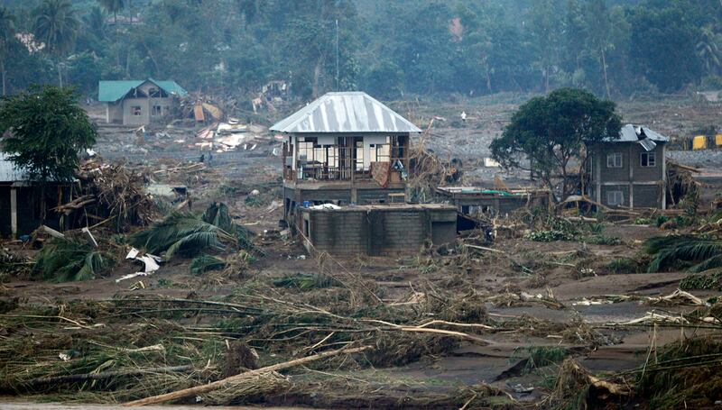 galleries/2011/12/17/philippines-typhoon-kills-hundreds-photos/philippines-floods-photos-house_fryfk3
