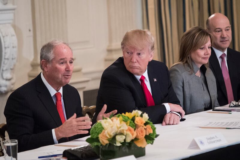 WASHINGTON, DC - FEBRUARY 3: President Donald Trump listens to Blackstone CEO Stephen Schwarzman, left, to business during a strategy and policy forum in the State Dining Room of the White House in Washington, DC on Friday, Feb. 03, 2017. (Photo by Jabin Botsford/The Washington Post via Getty Images)