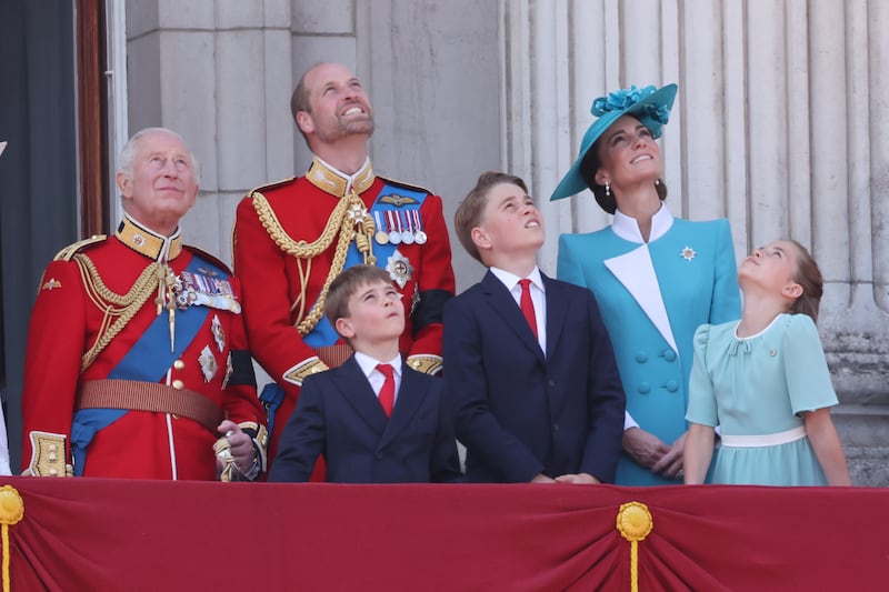 From left: King Charles III, Prince William, Prince Louis, Prince George, Catherine, Princess of Wales and Princess Charlotte watch a flyover on the balcony of Buckingham Palace during Trooping the Colour parade festivities on June 14, 2025 in London.