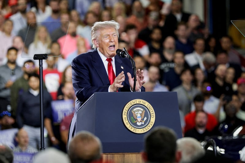 U.S. President Donald Trump delivers remarks during an event at the General Motors Milford Proving Ground in Milford, Michigan, U.S., July 27, 2026. REUTERS/Evan Vucci
