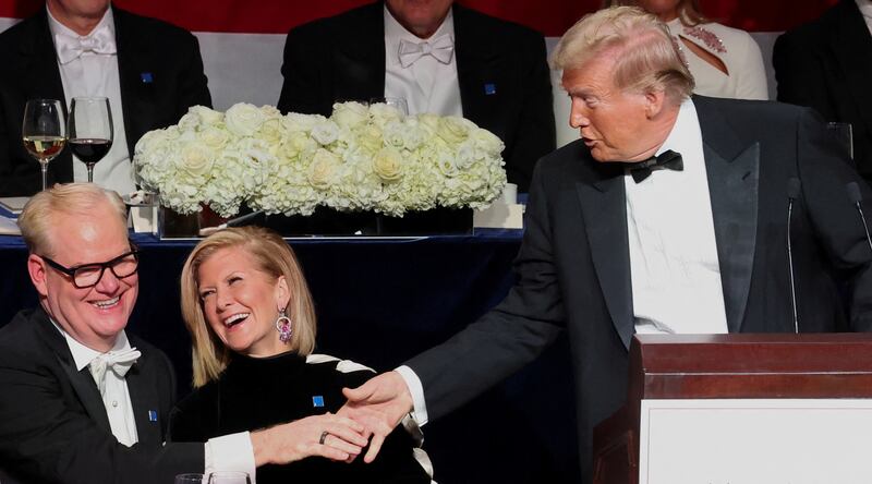 Jim Gaffigan, Mary Erdoes, and Donald Trump at the Al Smith Charity Dinner roast in New York City.