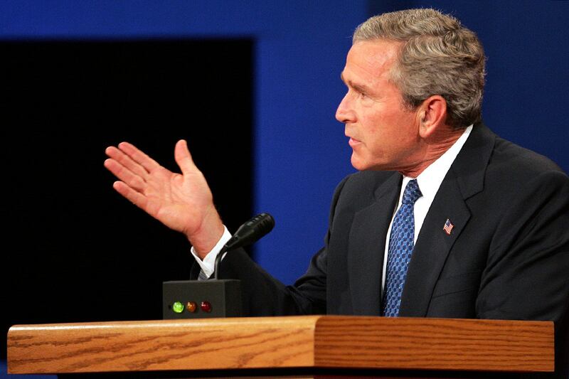 galleries/2012/10/05/romney-s-hanky-more-debate-cheating-conspiracy-theories-photos/GAL-pol-cheats-bush-cheat_gnepbj