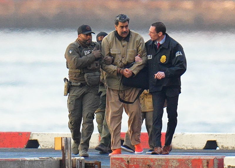 Nicolas Maduro is seen in handcuffs after landing at a Manhattan helipad, escorted by heavily armed Federal agents on January 5, 2026 in New York City.