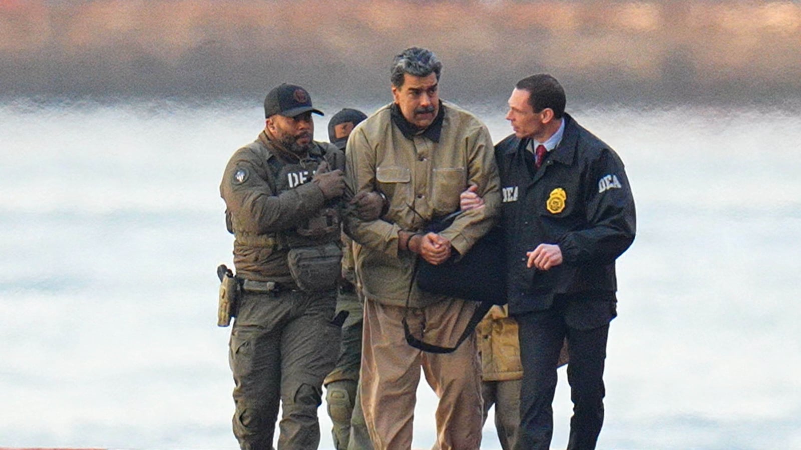 Nicolas Maduro is seen in handcuffs after landing at a Manhattan helipad, escorted by heavily armed Federal agents on January 5, 2026 in New York City.