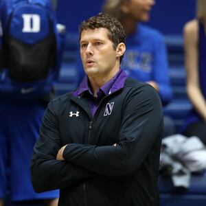 Northwestern University volleyball coach Shane Davis has been accused of hazing by a female player.