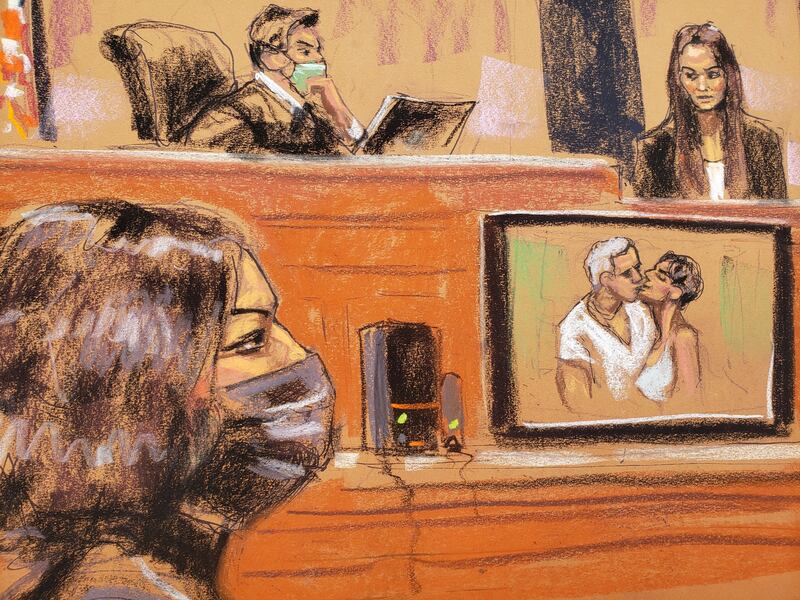 A photo of Ghislaine Maxwell and Jeffrey Epstein is shown as FBI analyst Kimberly Meder testifies during the trial of Maxwell, the Jeffrey Epstein associate accused of sex trafficking, in a courtroom sketch in New York City on December 7, 2021.