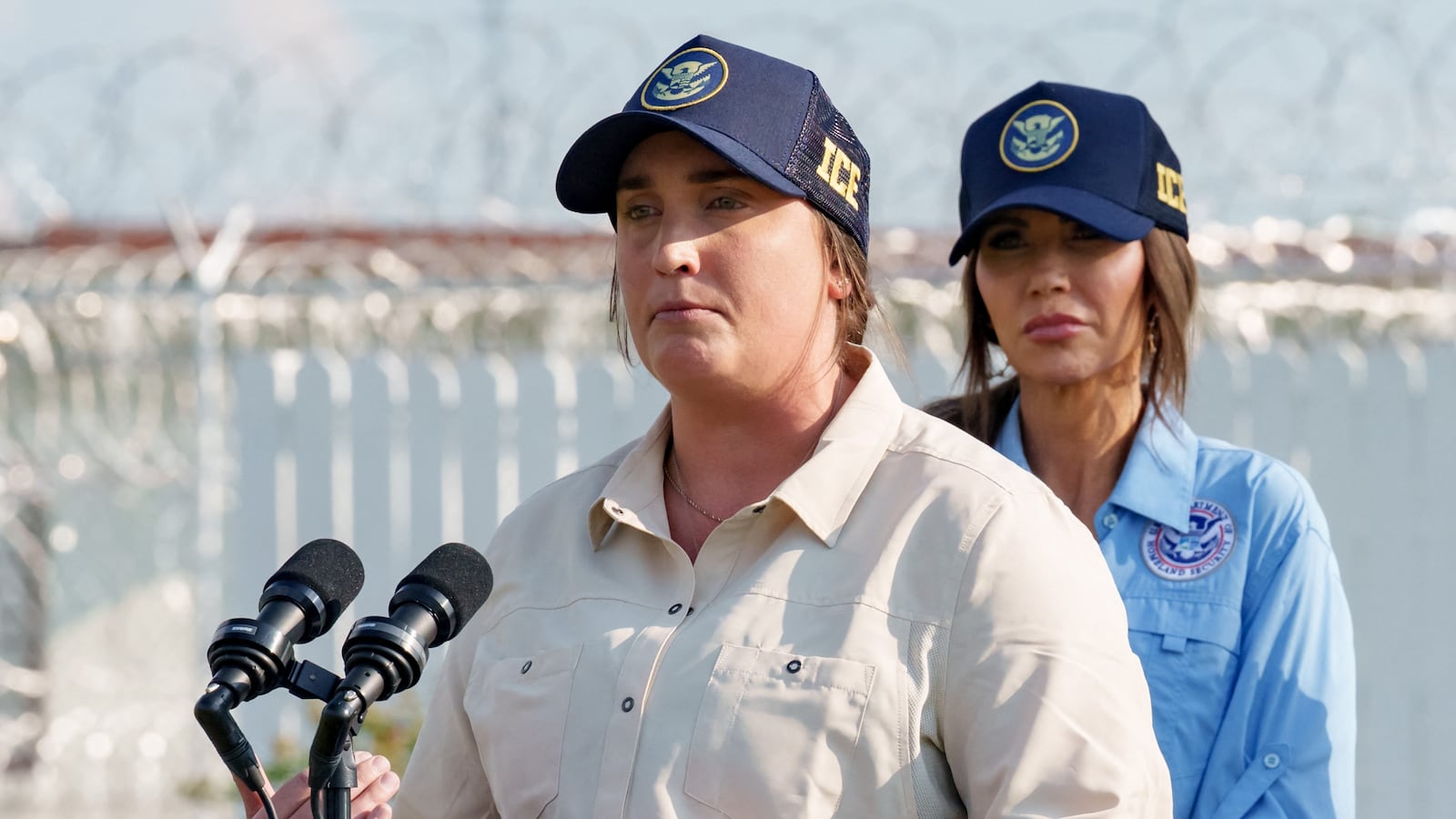 ICE Deputy Director Madison Sheahan (L), along with US Attorney General Pam Bondi (R) and US Secretary of Homeland Security Kristi Noem, participates in a press conference near Camp 57 at Angola Prison, the Louisiana State Penitentiary and America's largest maximum-security prison farm, to announce the opening of a new US Immigration and Customs Enforcement (ICE) facility that will house immigrants convicted of crimes in West Feliciana Parish, Louisiana, near the town of St. Francisville on September 3, 2025.