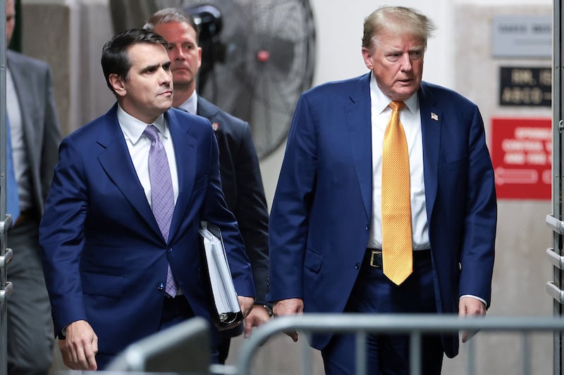 Donald Trump and his Todd Blanche walk amid Trump's trial for allegedly covering up hush money payments, at Manhattan Criminal Court on May 7, 2024, in New York City, U.S.