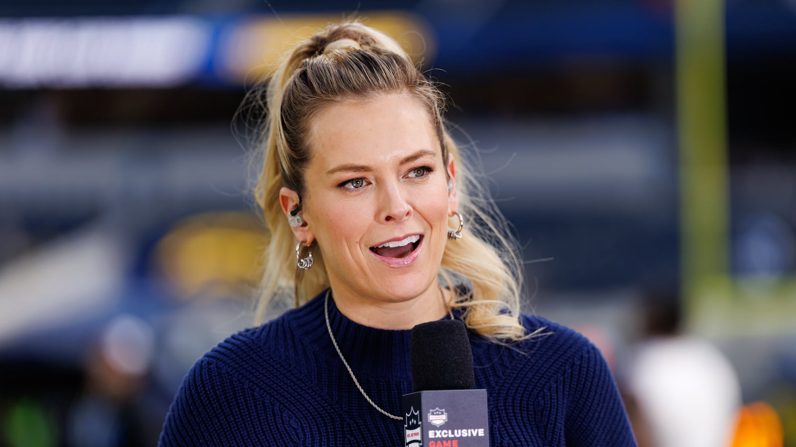 Reporter Jamie Erdahl stands on the field prior to an NFL football game between the Houston Texans and the Los Angeles Chargers at SoFi Stadium