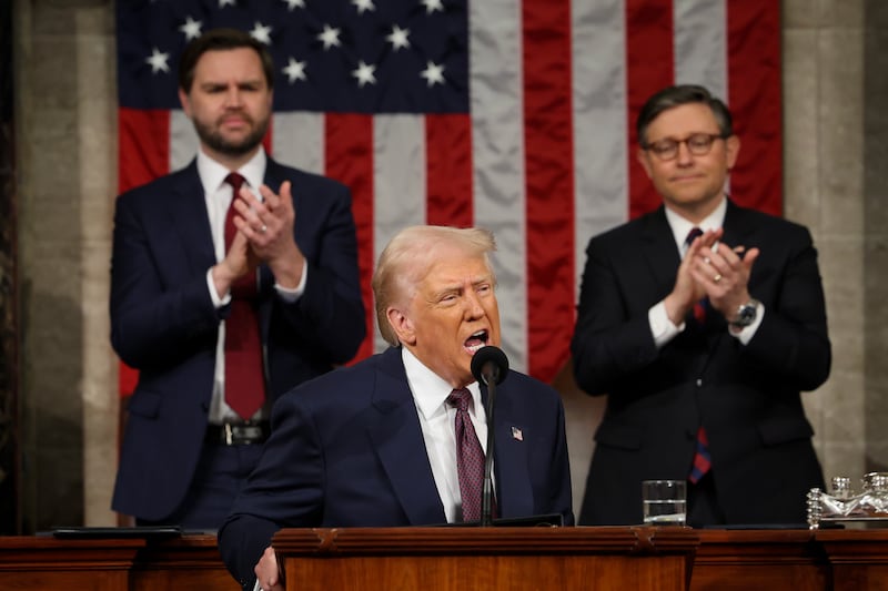 WASHINGTON, DC - MARCH 04: U.S. President Donald Trump addresses a joint session of Congress at the U.S. Capitol on March 04, 2025 in Washington, DC. Vice President JD Vance and Speaker of the House Mike Johnson (R-LA) applaud behind him. President Trump was expected to address Congress on his early achievements of his presidency and his upcoming legislative agenda. (Photo by Win McNamee/Getty Images)