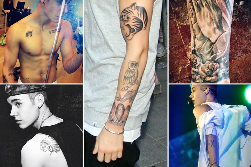galleries/2013/05/02/justin-bieber-s-tattoos-a-selena-gomez-look-a-like-a-crown-jesus-ink-and-more/130430-bieber-tattoos-tease_tt36yx