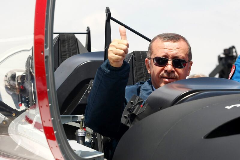 articles/2014/03/24/turkish-pm-accused-of-playing-war-games-ahead-of-elecion/140323-turkey-jet-tease_puruiv