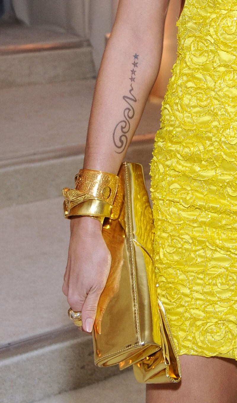 galleries/2012/09/05/kate-moss-to-gisele-bundchen-tattoos-guess-the-model-s-tattoos-photos/model-tattoos-klum-close_qii2e6