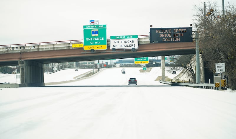 hildren sled down a hill at Doss Elementary following a winter storm that brought rain, sleet, and freezing temperatures to North Austin.