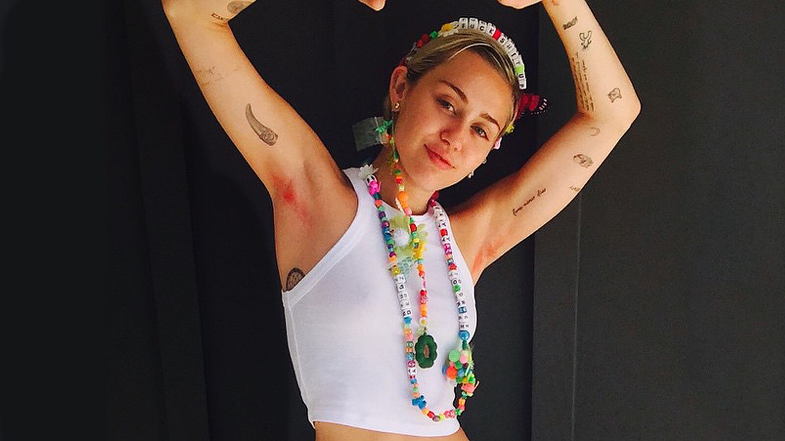 articles/2015/06/11/miley-cyrus-s-coming-out-party/150610-zimmerman-miley-tease_yplbye