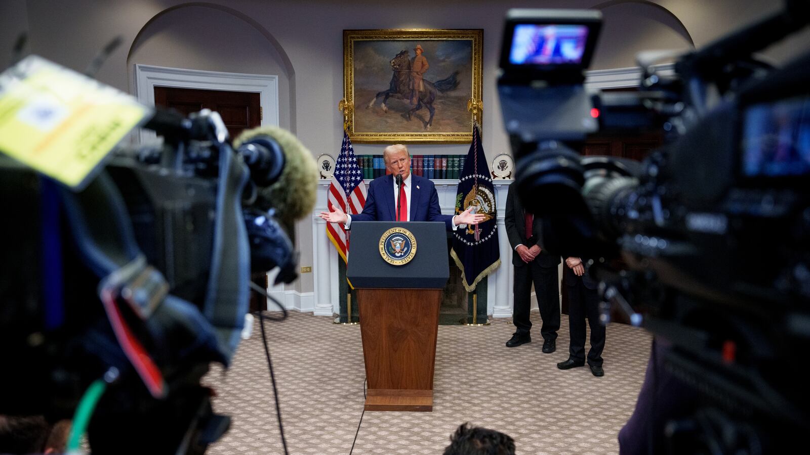 Donald Trump speaks during a news conference in the Roosevelt Room of the White House