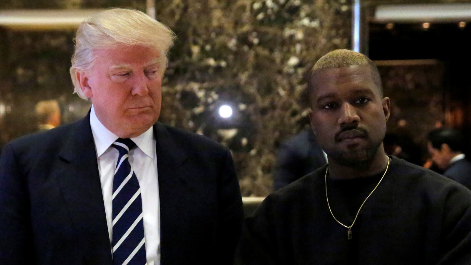 cheats/2017/01/19/kanye-west-not-invited-to-play-inauguration-because-it-s-traditionally-american/170119-trump-kanye-west-cheat_dngp6r