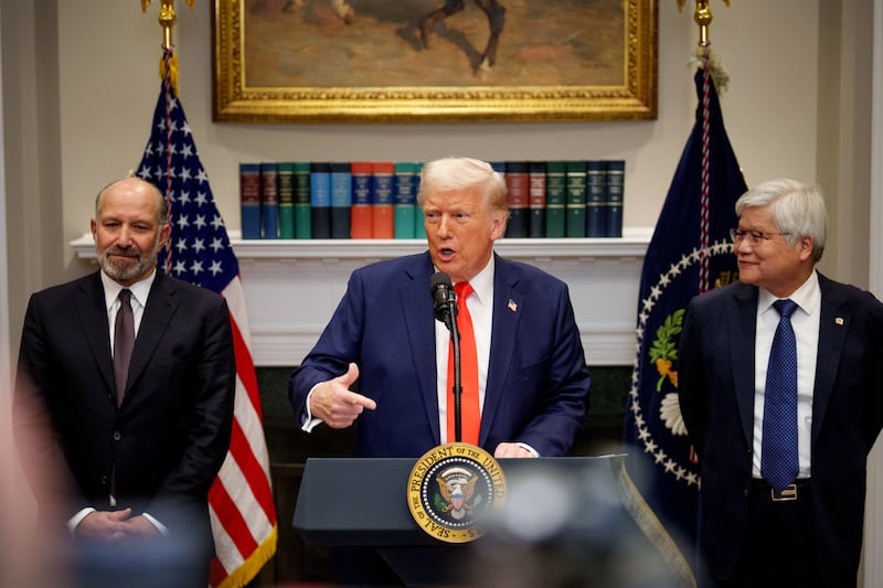 U.S. President Donald Trump, accompanied by Commerce Secretary Howard Lutnick (L) and Taiwan Semiconductor Manufacturing Company (TSMC) CEO C.C. Wei (R), speaks in the Roosevelt Room of the White House on March 3, 2025 in Washington, DC.