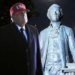 President Donald Trump looks at a newly installed statue of Alexander Hamilton that was mistaken for one of Thomas Jefferson, as he returns to the White House, after Israel and the U.S. launched strikes on Iran, in Washington, D.C., on March 1, 2026.