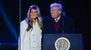 WASHINGTON, DC - DECEMBER 04: U.S. President Donald Trump and first lady Melania Trump participate in the 103rd National Christmas Tree Lighting Ceremony at the White House Ellipse on December 04, 2025 in Washington, DC. The tree is a 32-foot-tall red spruce from the George Washington and Jefferson National Forests in Virginia's Highland County. This is the second year in a row that the George Washington and Jefferson National Forests have provided the tree. (Photo by Chip Somodevilla/Getty Images)