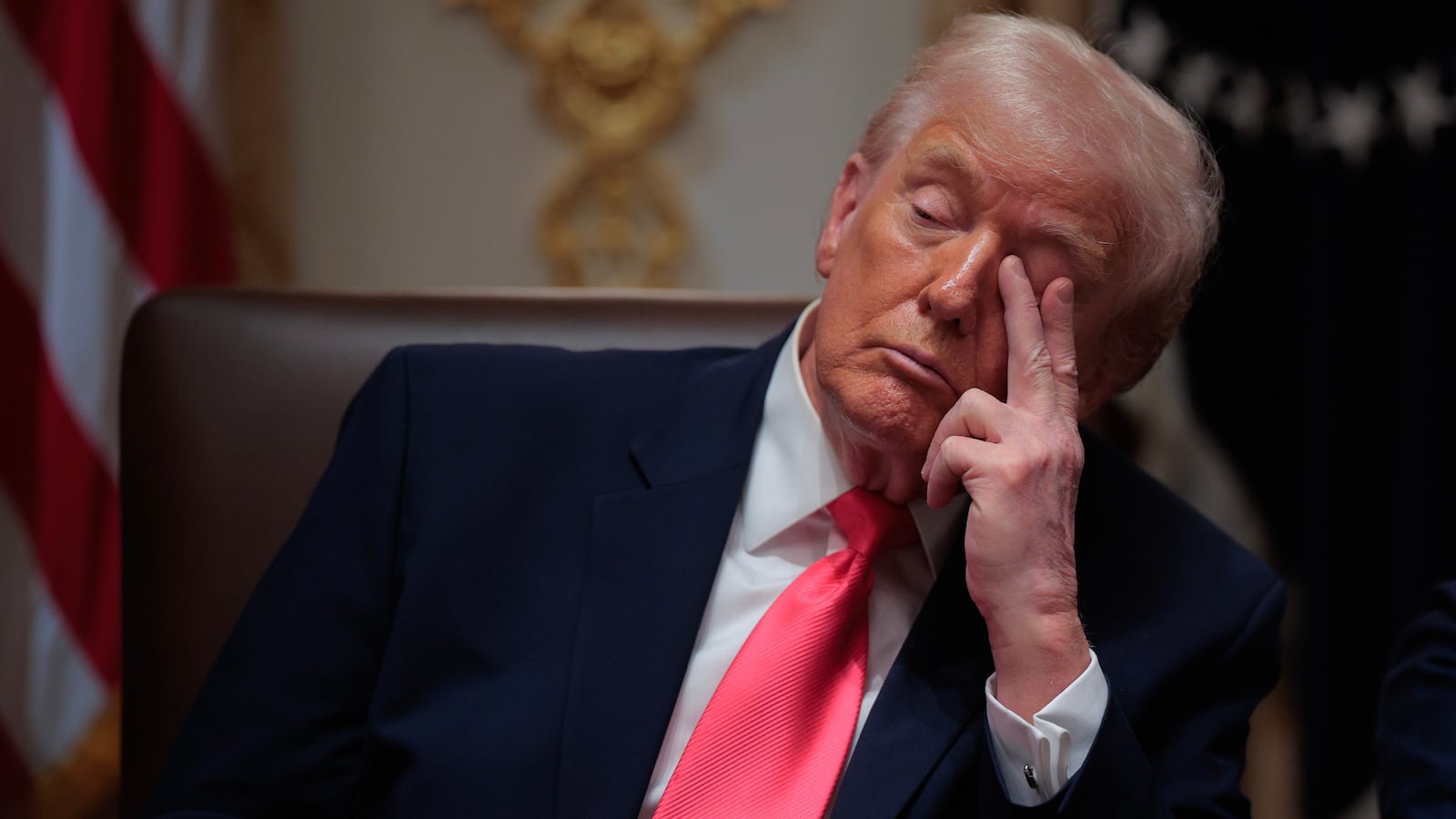 President Donald Trump attends a meeting of his Cabinet in the Cabinet Room of the White House on December 02, 2025 in Washington, DC.