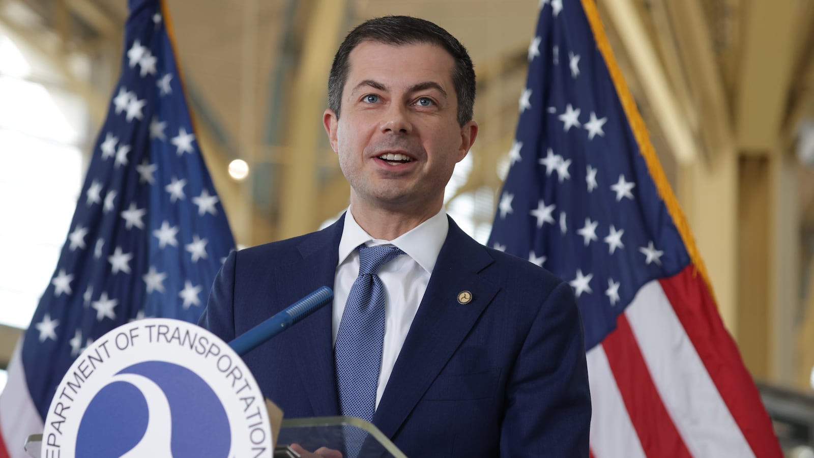 Pete Buttigieg speaks to questions during a news conference in Arlington, Virginia.