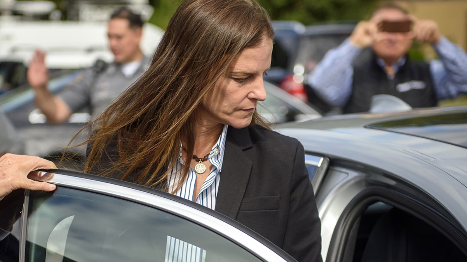 A photo of Michelle Troconis leaving court.