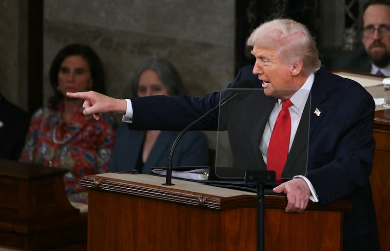 President Donald Trump points as he delivers the State of the Union address in the House Chamber of the U.S. Capitol in Washington, DC, on February 24, 2026.