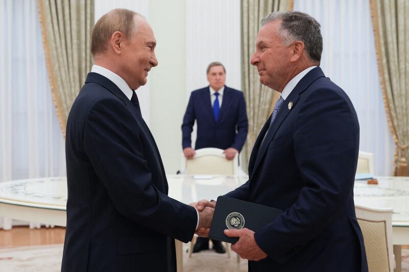 TOPSHOT - In this pool photograph distributed by the Russian state agency Sputnik, Russia's President Vladimir Putin greets US Special Envoy Steve Witkoff prior to their talks in Moscow on August 6, 2025. (Photo by Gavriil Grigorov / POOL / AFP) (Photo by GAVRIIL GRIGOROV/POOL/AFP via Getty Images)