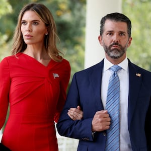 Donald Trump Jr. and Bettina Anderson attend a ceremony held by U.S. President Donald Trump to award posthumously the Medal of Freedom to Charlie Kirk in the Rose Garden at the White House in Washington, D.C., U.S., October 14, 2025.