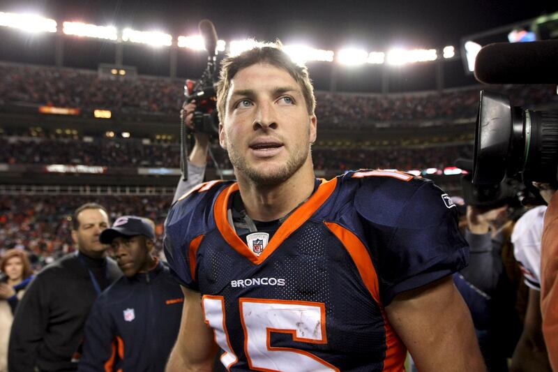 articles/2011/12/14/tebowing-goes-global-aswinning-denver-quarterback-dazzles/tim-tebow-bissinger_kw48fo