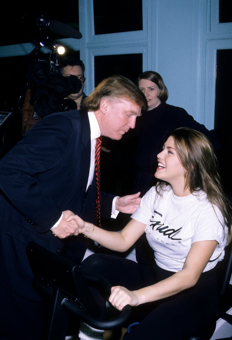 Donald Trump and Alicia Machado at Miss Universe works out event, New York, January 28, 1996. She accused him of calling her "Miss Piggy" after she was crowned Miss Universe because she gained weight.